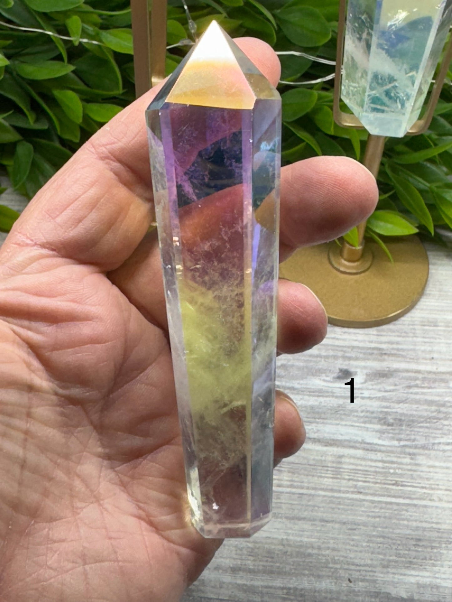 Angel Aura Clear Quartz Wand on stand