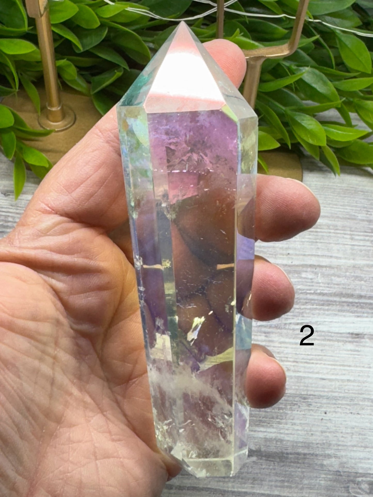 Angel Aura Clear Quartz Wand on stand